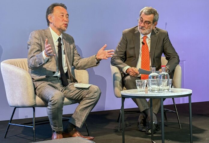 Yoshihiro Nakata and Luca Ciferri on stage at the Automotive News Congress Europe 02